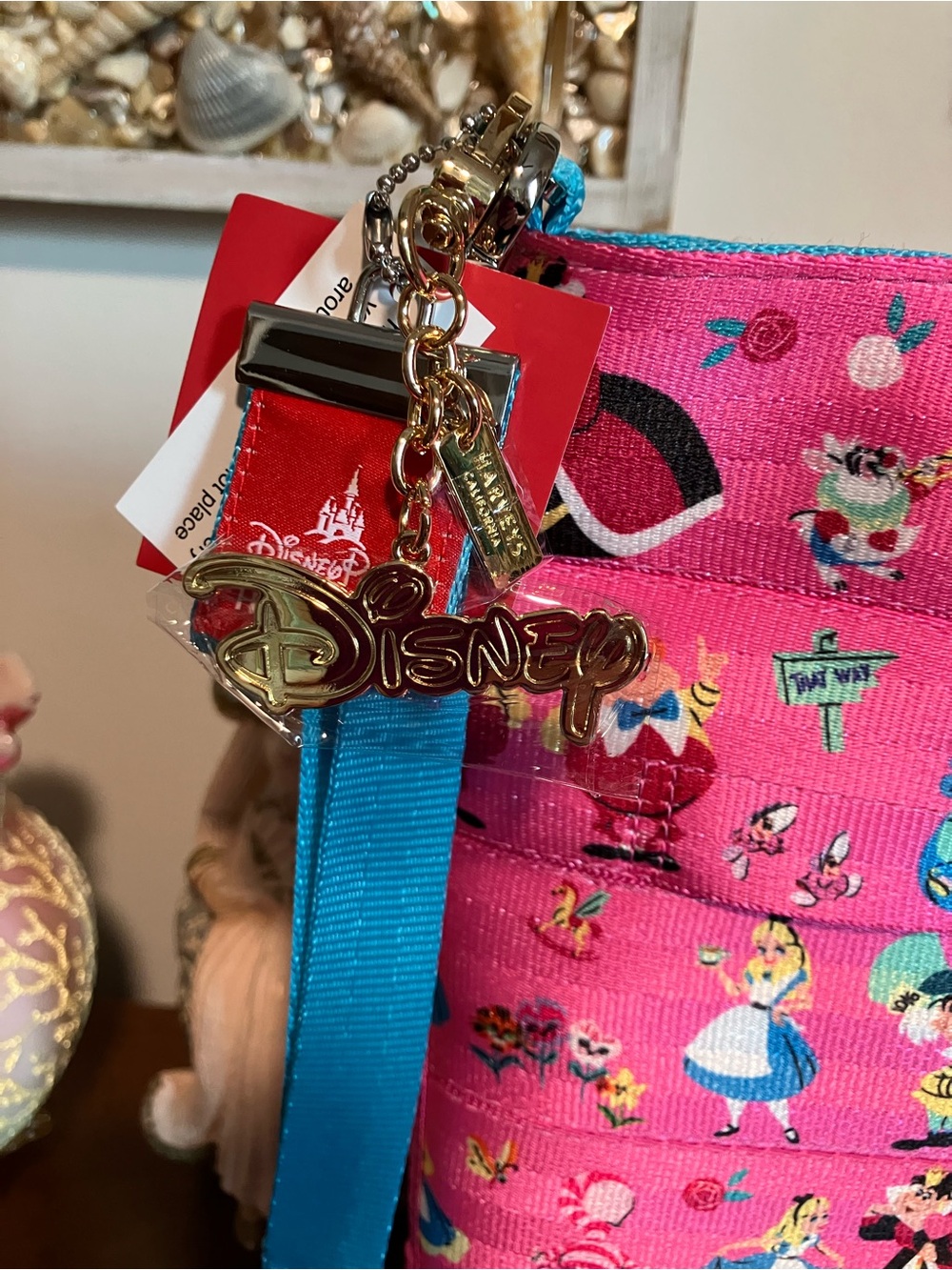 Harveys Seatbelt Disney Alice in Wonderland Pink Crossbody Bag with Blue Strap - Picture 2 of 6
